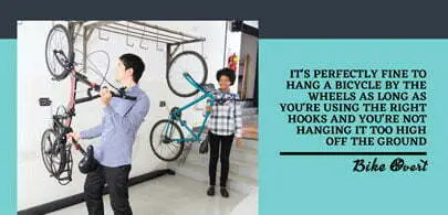 Is it OK to hang a bicycle by the wheels?